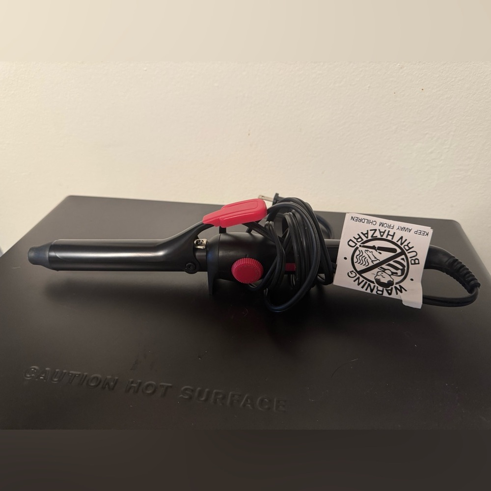 Black and Pink Remington Curling Iron